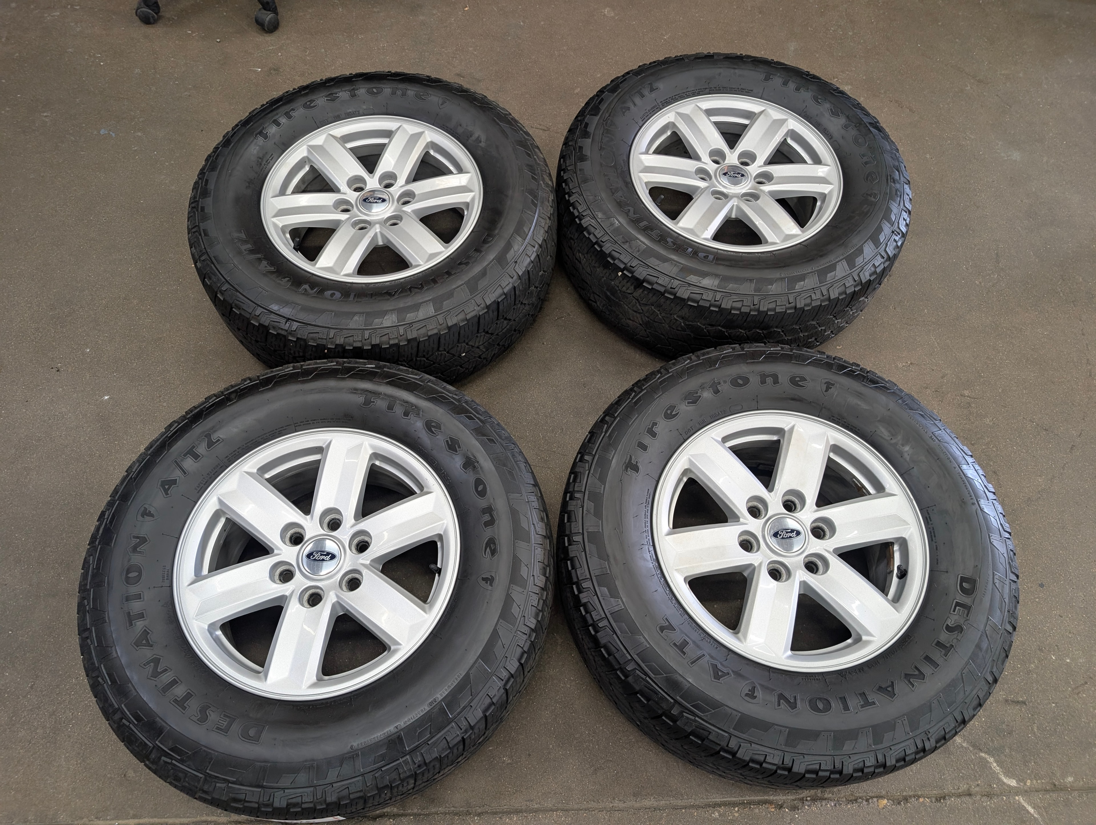 Used 17" Ford F-150 6 Lug Alloy Wheels with Firestone Destination A/TZ Tires